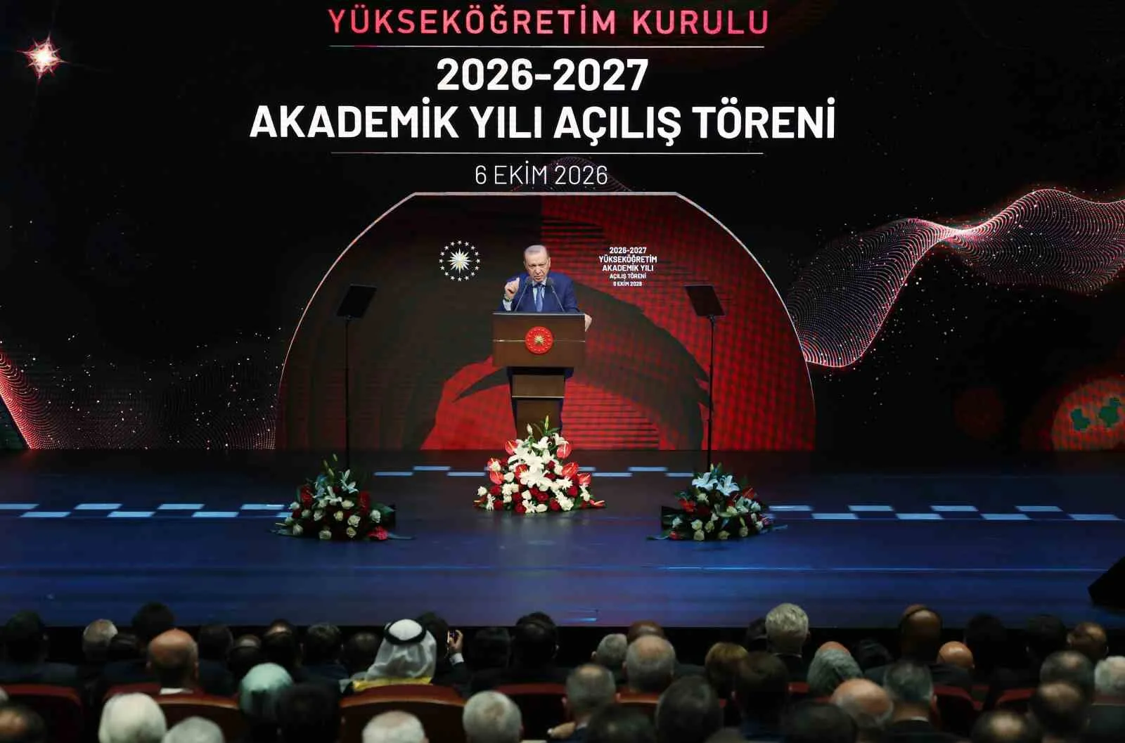 BURADA KONUŞAN ERDOĞAN, YENİ AKADEMİK YILIN YÜKSEKÖĞRETİM CAMİASI BAŞTA OLMAK ÜZERE ÜLKE VE MİLLET İÇİN HAYIRLARA VESİLE OLMASINI DİLEYEREK, ÖĞRENCİLERİN YENİ BİLGİ VE TECRÜBELER EDİNECEĞİ, AKADEMİSYENLERİN YENİ YAYIN VE ARAŞTIRMA FAALİYETLERİYLE TEMAYÜZ EDECEĞİ BİR AKADEMİK YIL GEÇİRİLMESİNİ TEMENNİ ETTİ.