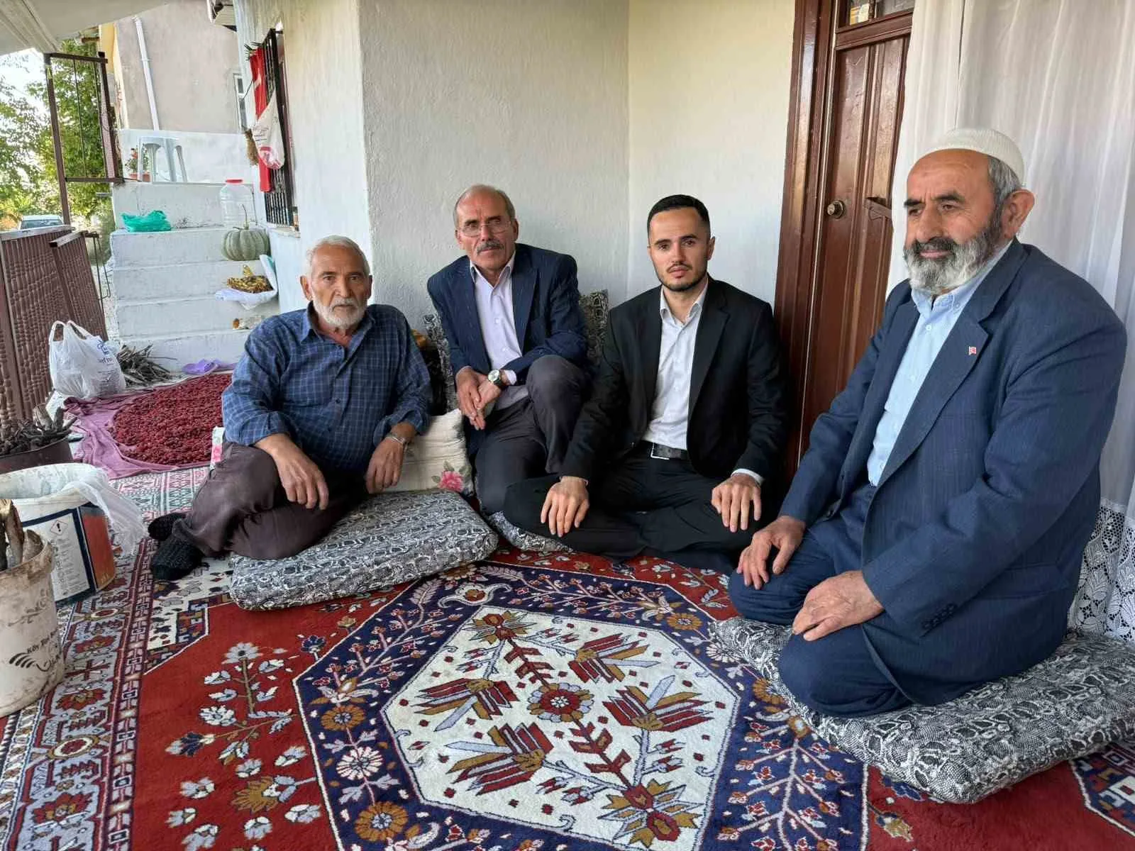 MHP’Lİ HEYETTEN KULUNCAK’TA ŞEHİT AİLELERİNE ZİYARET